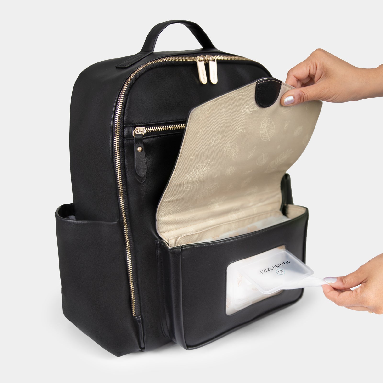 Peek-A-Boo Vegan Leather Diaper Bag Backpack 2.0 in Black – TWELVElittle Peek-A-Boo Vegan Leather Diaper Bag Backpack 2.0 in Black – TWELVElittle
