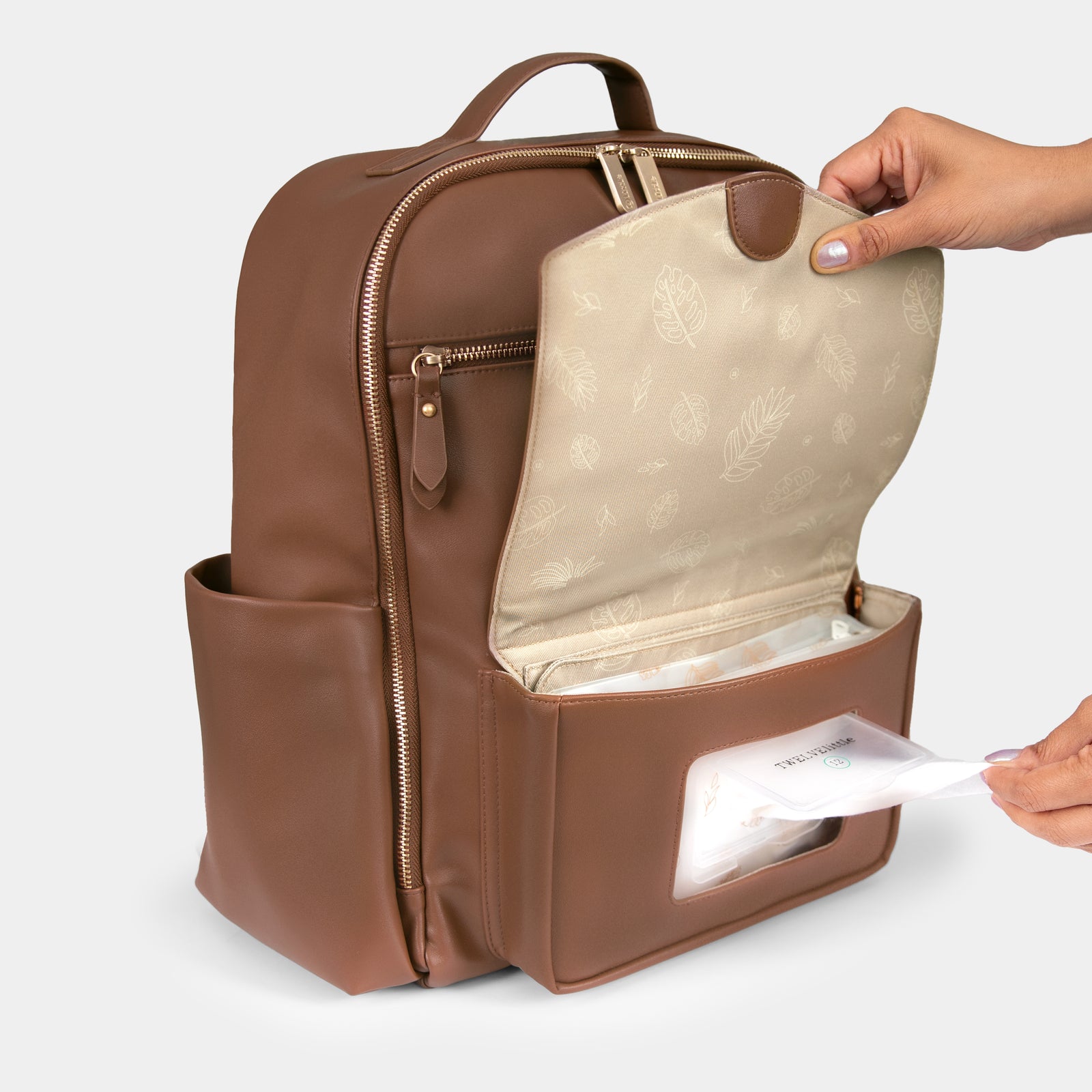 Peek-A-Boo Vegan Leather Diaper Bag Backpack in Toffee